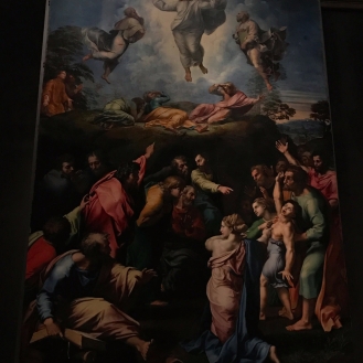 Transfiguration--by Raffaello Sanzio. This famous painting is made up of two parts: the upper half which depicts Christ transfigured on Mount Tabor between Elijah and Moses, and the bottom half, where the apostles are attempting to cure a boy possessed by demons.